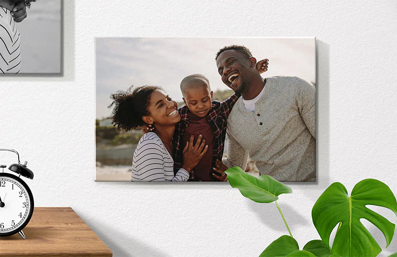 ["Personalised Photo Canvas Prints by Printerpix", "Collage Canvas Print of Two Happy Friends", "Canvas Print Sizes", "Mother Lovingly Kissing Her Young Son on Canvas Print", "Gallery Wall with Canvas Prints", "Canvas Print of a Couple Enjoying Their Holiday", "", "", "", ""]