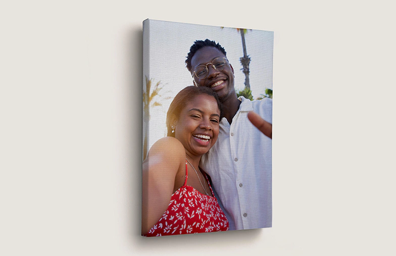 ["Personalised Photo Canvas Prints from Printerpix","Canvas Prints","Canvas Print Sizes","Mother lovingly kisses her young son on a canvas print","Gallery wall with canvas prints","Canvas print of a couple enjoying their holiday","","","","",""]