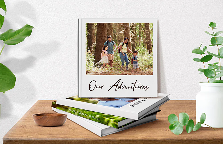 ["Hardcover Personalised Photobooks by Printerpix", "Individually Printed Printerpix Photo Album with Hardcover and Large Photos of an Elderly Couple", "Personalised Photo Album with Romantic Pictures of a Couple and Photo Cover", "Family Photo Album with Custom Printed Cover and Family Name", "Pet and Woman Looking at Personalised Family Photo Album with Custom Design", "Two People Looking at a Printerpix Photo Album with Wedding Photos and Bride", "", "", "", "", ""]